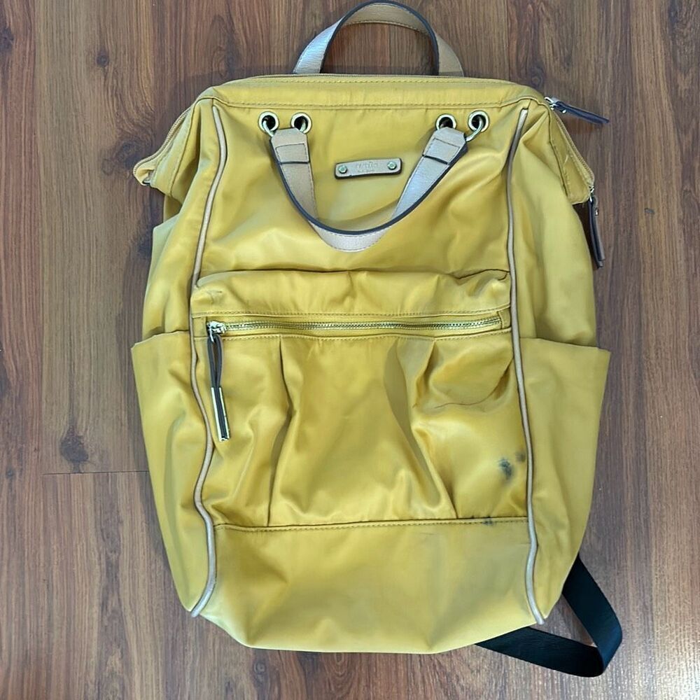 Tutilo New York mustard color knapsack bag as is